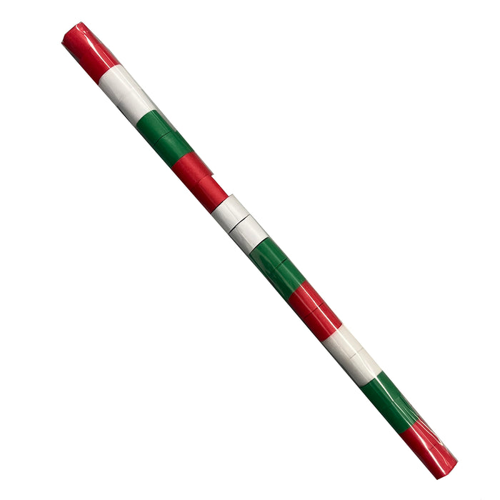Close-up of red and green streamers on white background Stock